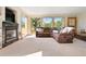 Spacious living room with fireplace, views, and comfortable seating at 713 Aspen Rd, Golden, CO 80401