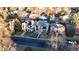 Expansive aerial view showcases the neighborhood, highlighting tree-lined streets and the property's location at 220 Glencoe St, Denver, CO 80220