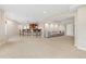 Open basement with large bar area, comfortable seating, and ample space for entertaining at 2832 Danbury Ave, Highlands Ranch, CO 80126