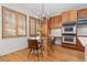 Charming kitchen nook with natural light and seating for four at 2832 Danbury Ave, Highlands Ranch, CO 80126