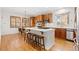 Bright kitchen with an island, stainless steel appliances, and a breakfast nook at 2832 Danbury Ave, Highlands Ranch, CO 80126