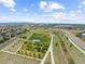 Aerial view of community park with playground and walking paths at 4942 Wabash St, Denver, CO 80238