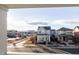 View of house from balcony, showcasing neighborhood and amenities at 4942 Wabash St, Denver, CO 80238