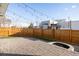 Private backyard with firepit and string lights at 4942 Wabash St, Denver, CO 80238