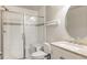 Bathroom with walk-in shower and updated vanity at 4942 Wabash St, Denver, CO 80238