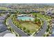 Aerial view of community pool and surrounding green space at 4942 Wabash St, Denver, CO 80238