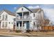 Two-story craftsman style home with front porch at 4942 Wabash St, Denver, CO 80238