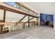 Inviting loft space with built-in shelves and cozy area, perfect for relaxing or working at 6225 E Mississippi Ave, Denver, CO 80224