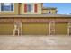Three-car garage with ample parking space and easy access to the property at 15496 W 66Th Dr # G, Arvada, CO 80007