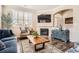 Bright living room with lots of natural light from large windows and sleek modern fireplace at 15496 W 66Th Dr # G, Arvada, CO 80007
