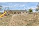 Expansive backyard with playset, offering ample space for outdoor activities and Gathering fun at 1632 S County Road 137, Bennett, CO 80102