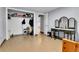 Large closet with hanging storage and shelves, adjacent to a mirrored makeup vanity in a neutrally-toned room at 1632 S County Road 137, Bennett, CO 80102