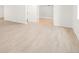 Finished basement area with durable flooring and a view to the other rooms at 13971 Star Creek Dr, Broomfield, CO 80023