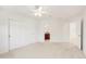 Bright bedroom featuring a ceiling fan, closet, and attached bathroom access at 13971 Star Creek Dr, Broomfield, CO 80023