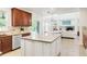 Modern kitchen featuring an island with granite countertops at 13971 Star Creek Dr, Broomfield, CO 80023