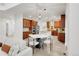 Open kitchen with stainless steel appliances and island at 13971 Star Creek Dr, Broomfield, CO 80023
