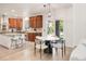 Eat-in kitchen featuring a marble island and stainless steel appliances at 13971 Star Creek Dr, Broomfield, CO 80023