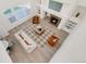 Overhead view of a modern living room with a fireplace at 13971 Star Creek Dr, Broomfield, CO 80023