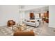 Bright living room featuring modern furnishings and light wood flooring at 13971 Star Creek Dr, Broomfield, CO 80023