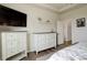 Bedroom features hardwood floors and is complete with modern furnishings and decor at 16516 Fairbanks Rd, Platteville, CO 80651