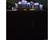 Night shot of a charming home with decorative lighting highlighting its architectural details at 16516 Fairbanks Rd, Platteville, CO 80651