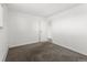 Spacious bedroom featuring neutral carpet and a sunny window at 10150 E Virginia Ave # 4-104, Denver, CO 80247