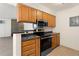 Well-equipped kitchen featuring modern appliances and ample cabinet space at 10150 E Virginia Ave # 4-104, Denver, CO 80247