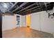 Spacious unfinished basement with multiple doorways and exposed ceiling provides ample space at 3320 N Columbine St, Denver, CO 80205