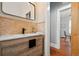 Charming bathroom with a modern vanity, stylish mirror at 3320 N Columbine St, Denver, CO 80205