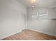 White room with wood-look floors featuring natural light and clean lines at 3320 N Columbine St, Denver, CO 80205