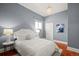 Comfortable bedroom features a chandelier, with natural light and a stylish decor at 3320 N Columbine St, Denver, CO 80205