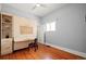 Cozy bedroom with hardwood floors, Murphy bed and attached desk at 3320 N Columbine St, Denver, CO 80205