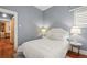 Comfortable bedroom features a chandelier, with natural light and a stylish decor at 3320 N Columbine St, Denver, CO 80205
