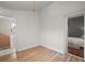 White room with wood-look floors featuring natural light and clean lines at 3320 N Columbine St, Denver, CO 80205