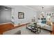 Comfortable living room featuring a fireplace and hardwood floors at 3320 N Columbine St, Denver, CO 80205