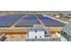 Home with convenient access to community solar panels, as seen in aerial view at 5147 N Waco St, Denver, CO 80249