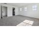 Large main bedroom with ensuite bath and multiple bright windows at 25214 E Warren Pl, Aurora, CO 80018