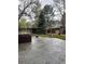 Backyard featuring a patio, hot tub, and privacy fence at 12381 E Vassar Dr, Aurora, CO 80014