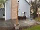 Backyard patio with outdoor dining and hot tub area at 12381 E Vassar Dr, Aurora, CO 80014