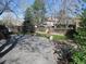Backyard featuring an outdoor living space including a small lawn and concrete patio at 12381 E Vassar Dr, Aurora, CO 80014
