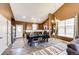 Large kitchen with hardwood floors, lots of storage and stainless steel refrigerator at 56607 E 23Rd Ave, Strasburg, CO 80136