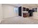Basement living area, wet bar area, and egress window for secondary living at 19033 E 22Nd Cir, Aurora, CO 80011
