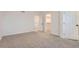 Neutral bedroom featuring plush carpet, closet, and freshly painted walls at 19033 E 22Nd Cir, Aurora, CO 80011