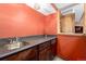 The basement features a dark countertop and cabinets at 3411 S Olathe Way, Aurora, CO 80013