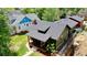 Aerial shot of a cozy home with a charming front porch and well-maintained landscaping at 4321 Winona Ct, Denver, CO 80212