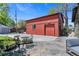 Detached two-car garage with additional outdoor seating area at 4321 Winona Ct, Denver, CO 80212