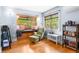 Inviting living room features a window seat and plush seating area with natural light at 4321 Winona Ct, Denver, CO 80212