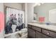 Bathroom with shower/tub combo and granite vanity at 16122 Emporia Way, Brighton, CO 80602