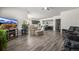 Bright living room with hardwood floors, fireplace, and open concept floor plan at 16122 Emporia Way, Brighton, CO 80602