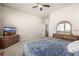 Main bedroom with carpeted floor, ceiling fan, and built-in dresser at 16122 Emporia Way, Brighton, CO 80602